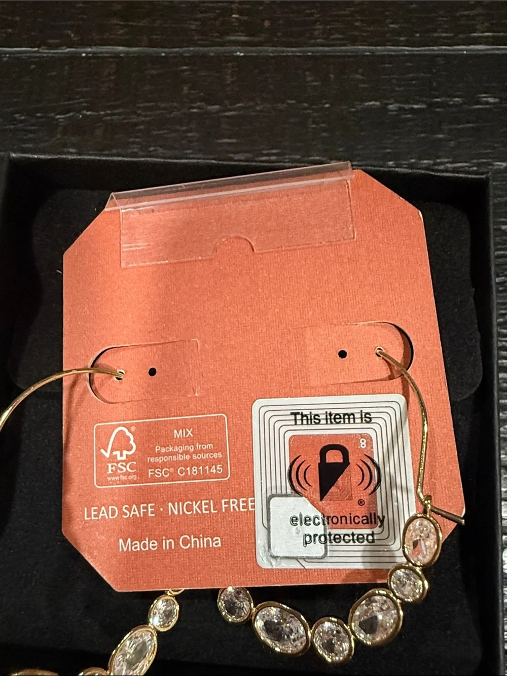 Camila Coelho Rose Gold Oval Hoop Earrings with Cubic Zirconia Accents